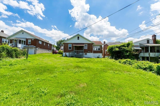 3807 Lawler Dr, Northwoods, MO 63121 - back of house with brick siding
