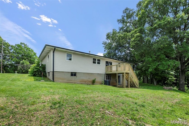 2848 S Hope St, Jackson, MO 63755 - rear view of property with stairs, a deck, central AC, and a yard