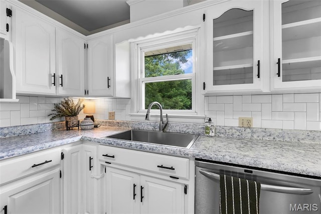 2848 S Hope St, Jackson, MO 63755 - kitchen with dishwasher, a sink, and white cabinets