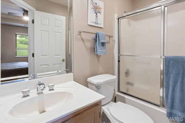 33 Monterey Dr Unit 2A, Lake Ozark, MO 65049 - bathroom with connected bathroom, enclosed tub / shower combo, vanity, and toilet