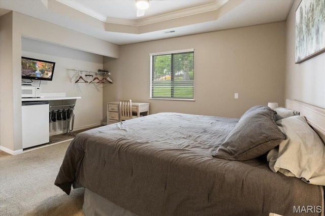33 Monterey Dr Unit 2A, Lake Ozark, MO 65049 - carpeted bedroom with a raised ceiling, fridge, and crown molding