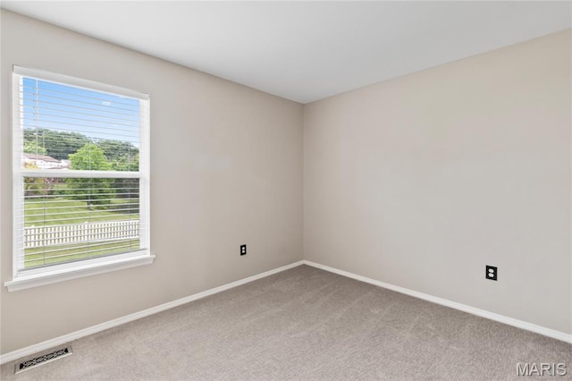 668 Top Notch Ln, Eureka, MO 63025 - spare room featuring carpet flooring and baseboards