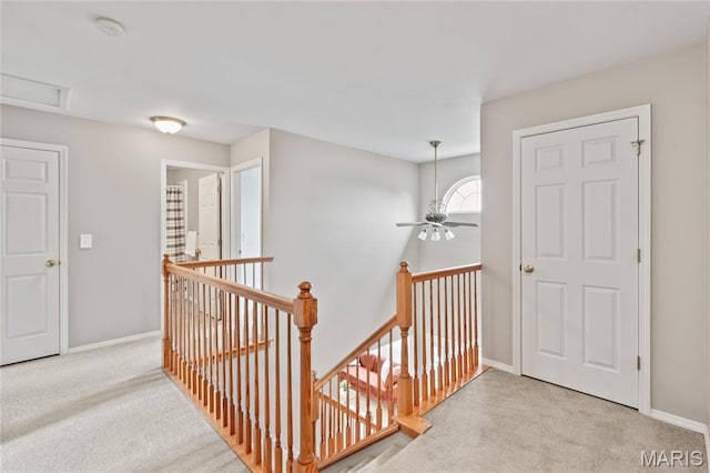 668 Top Notch Ln, Eureka, MO 63025 - hallway featuring an upstairs landing, carpet flooring, and baseboards