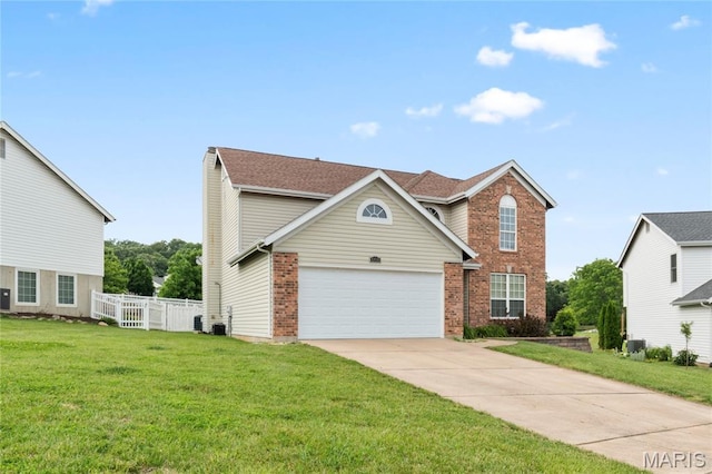 668 Top Notch Ln, Eureka, MO 63025 - traditional home with brick siding, a garage, and driveway
