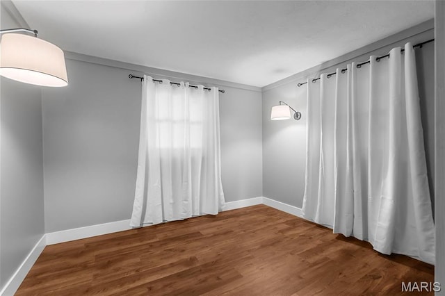 500 Frisco Rd, Campbell, MO 63933 - empty room featuring baseboards and wood finished floors