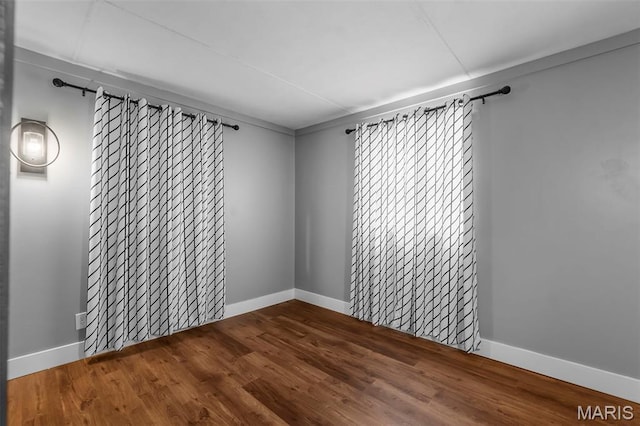 500 Frisco Rd, Campbell, MO 63933 - spare room featuring wood finished floors and baseboards