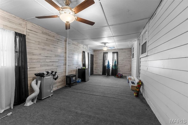 500 Frisco Rd, Campbell, MO 63933 - carpeted living area with ceiling fan and wood walls