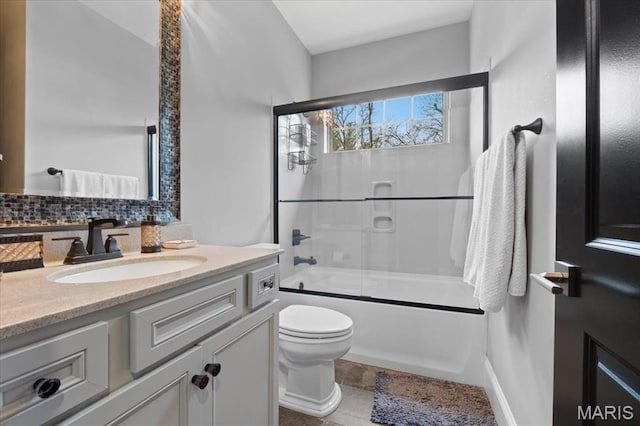 5 Watch Hill Rd, Ladue, MO 63124 - full bath with vanity, bath / shower combo with glass door, tasteful backsplash, and tile patterned floors