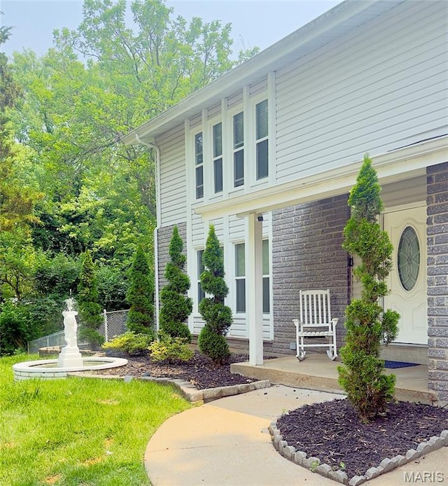 11630 Carolview Dr, Florissant, MO 63033 - doorway to property with brick siding