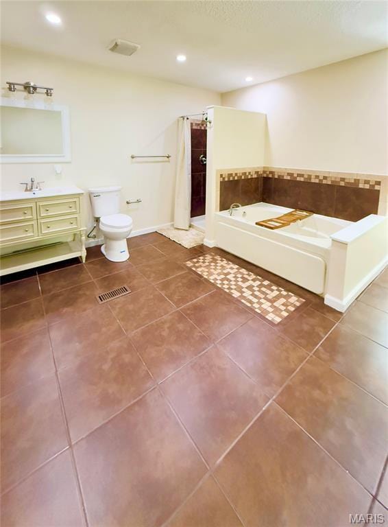 11630 Carolview Dr, Florissant, MO 63033 - full bath featuring a bath, tile patterned flooring, vanity, tiled shower, and recessed lighting