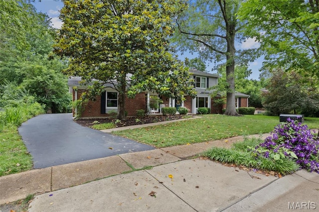 173 Portico Dr, Chesterfield, MO 63017 - view of front of property featuring brick siding and a front yard