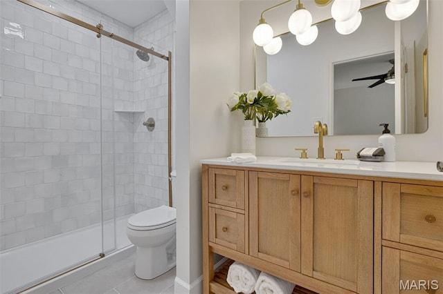 173 Portico Dr, Chesterfield, MO 63017 - bathroom with a shower stall, vanity, toilet, ceiling fan, and tile patterned flooring