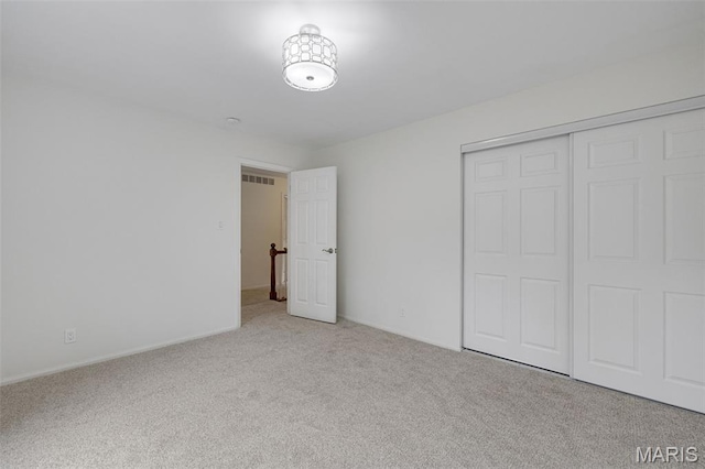 173 Portico Dr, Chesterfield, MO 63017 - unfurnished bedroom featuring carpet and a closet
