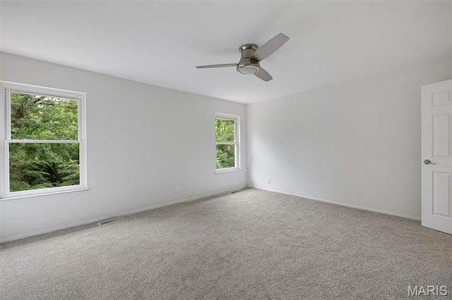 173 Portico Dr, Chesterfield, MO 63017 - carpeted empty room featuring a ceiling fan and baseboards