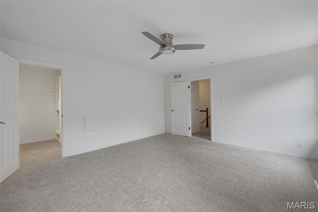 173 Portico Dr, Chesterfield, MO 63017 - carpeted empty room with a ceiling fan