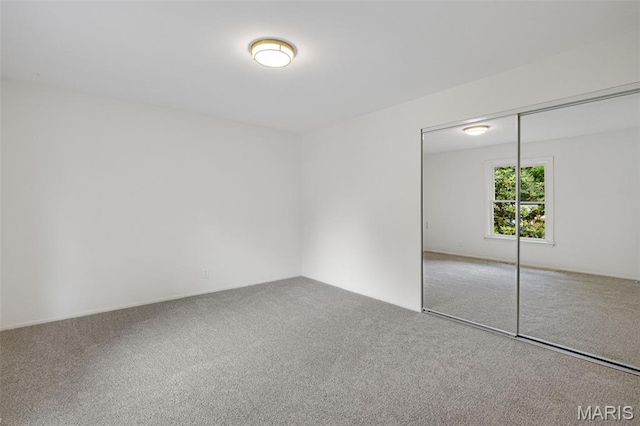 173 Portico Dr, Chesterfield, MO 63017 - unfurnished bedroom featuring carpet and a closet