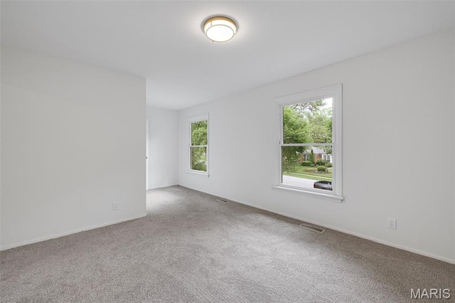 173 Portico Dr, Chesterfield, MO 63017 - carpeted empty room featuring baseboards