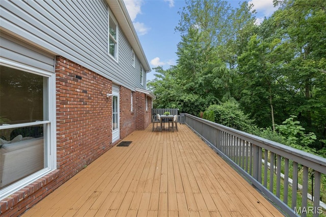 173 Portico Dr, Chesterfield, MO 63017 - wooden deck featuring outdoor dining space