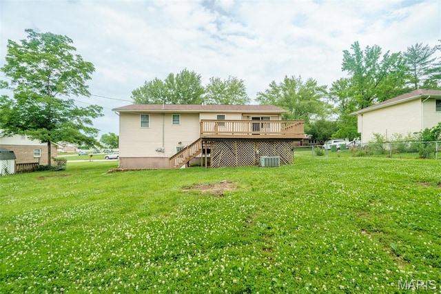 1804 Meadow Ct, Rolla, MO 65401 - rear view of property featuring a wooden deck, stairs, and central air condition unit