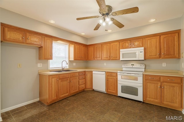 1804 Meadow Ct, Rolla, MO 65401 - kitchen featuring white appliances, a sink, light countertops, ceiling fan, and brown cabinetry