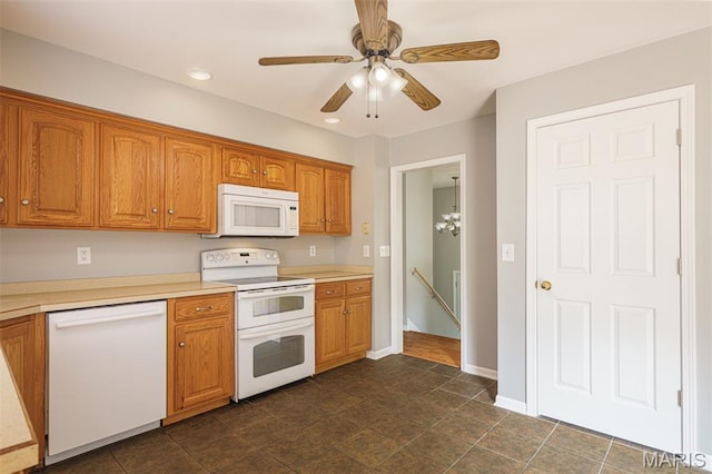 1804 Meadow Ct, Rolla, MO 65401 - kitchen with white appliances, light countertops, brown cabinetry, ceiling fan, and recessed lighting