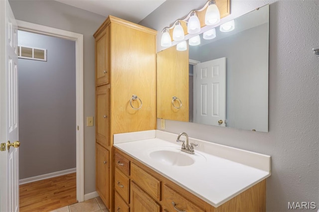 1804 Meadow Ct, Rolla, MO 65401 - bathroom with vanity and baseboards