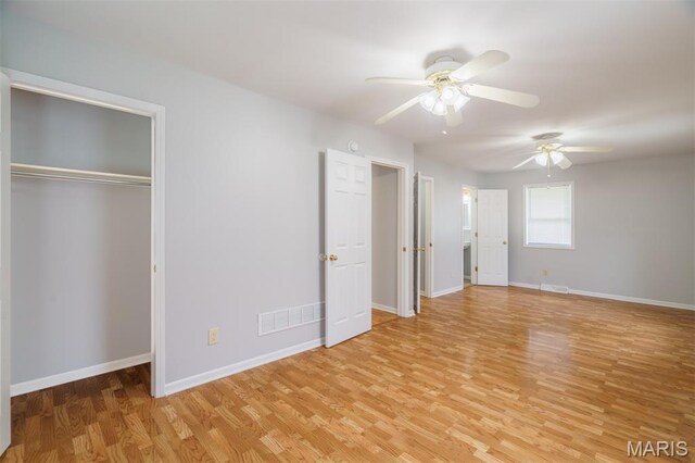 1804 Meadow Ct, Rolla, MO 65401 - unfurnished bedroom featuring light wood-type flooring, baseboards, ceiling fan, and a closet