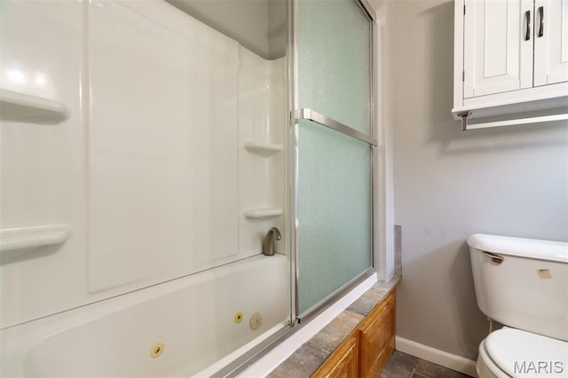 1804 Meadow Ct, Rolla, MO 65401 - bathroom with baseboards, toilet, and a combined bath / shower with jetted tub