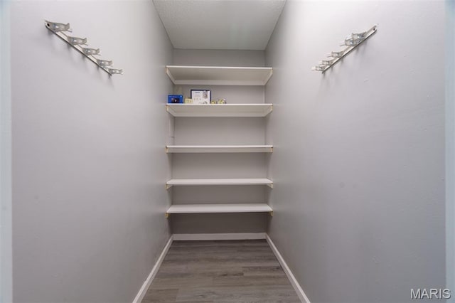 1804 Meadow Ct, Rolla, MO 65401 - spacious closet with wood finished floors