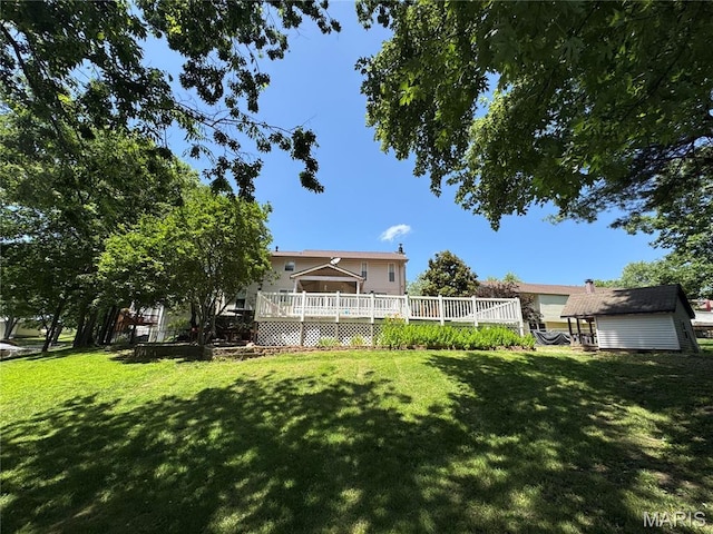 116 Shirewood Dr, Saint Charles, MO 63303 - view of green lawn featuring a wooden deck and an outbuilding
