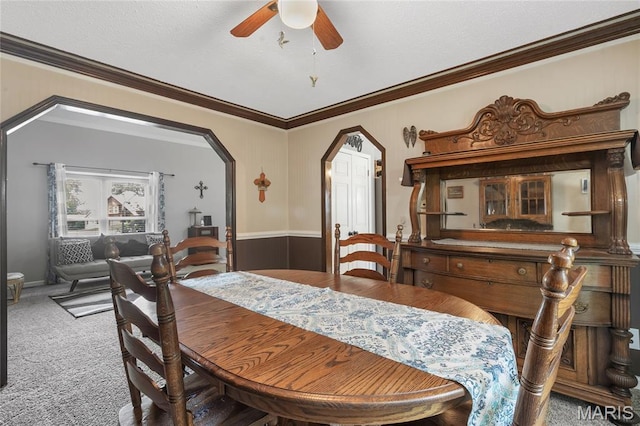 116 Shirewood Dr, Saint Charles, MO 63303 - dining area with carpet, a ceiling fan, crown molding, and arched walkways