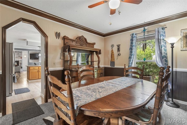 116 Shirewood Dr, Saint Charles, MO 63303 - dining space with ornamental molding, ceiling fan, and a textured ceiling