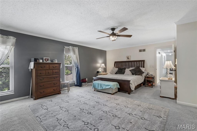 116 Shirewood Dr, Saint Charles, MO 63303 - carpeted bedroom featuring crown molding, a textured ceiling, and a ceiling fan