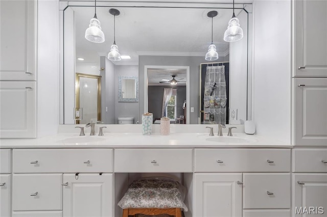 116 Shirewood Dr, Saint Charles, MO 63303 - bathroom with double vanity, ceiling fan, an enclosed shower, and crown molding