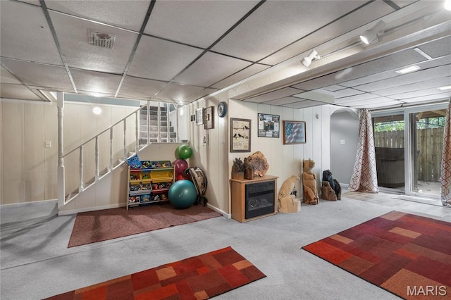 116 Shirewood Dr, Saint Charles, MO 63303 - basement featuring carpet, a drop ceiling, stairway, and arched walkways