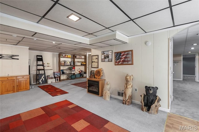 116 Shirewood Dr, Saint Charles, MO 63303 - workout area featuring light carpet, a drop ceiling, and arched walkways