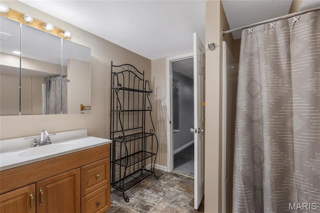 116 Shirewood Dr, Saint Charles, MO 63303 - bathroom with vanity, stone finish flooring, and a shower with shower curtain