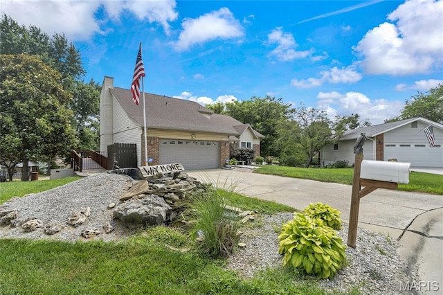 116 Shirewood Dr, Saint Charles, MO 63303 - view of side of property with driveway, a garage, brick siding, and a chimney