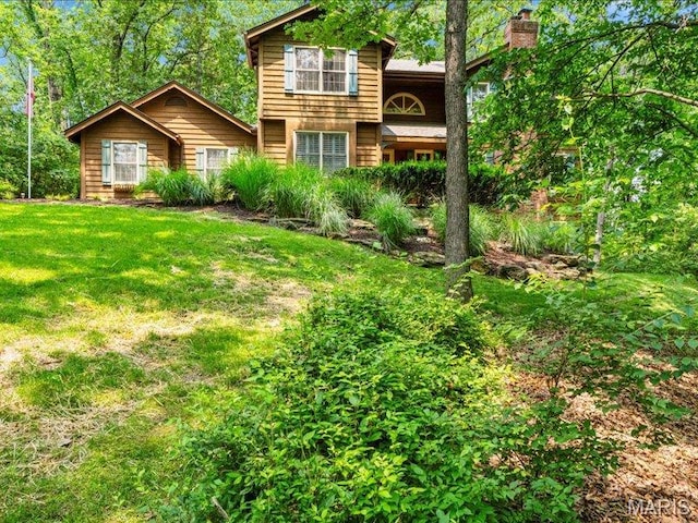 2254 Ridgley Woods Dr, Chesterfield, MO 63005 - view of front of property featuring a front yard and a chimney