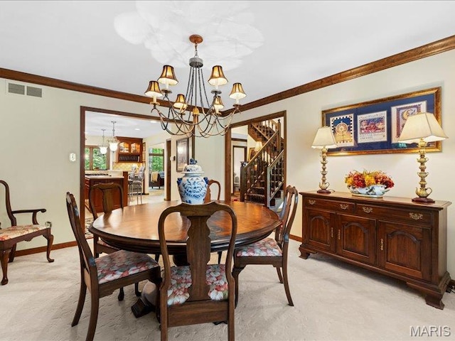 2254 Ridgley Woods Dr, Chesterfield, MO 63005 - dining space featuring a chandelier, stairway, light colored carpet, crown molding, and baseboards