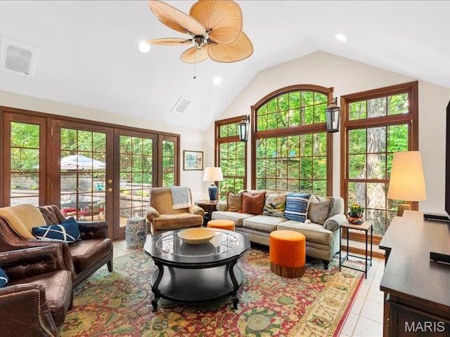 2254 Ridgley Woods Dr, Chesterfield, MO 63005 - living room featuring lofted ceiling, light tile patterned flooring, french doors, plenty of natural light, and recessed lighting