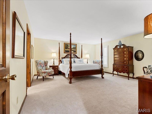 2254 Ridgley Woods Dr, Chesterfield, MO 63005 - bedroom featuring light colored carpet and baseboards