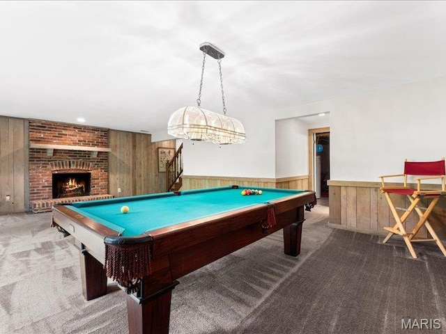 2254 Ridgley Woods Dr, Chesterfield, MO 63005 - game room with carpet flooring, billiards, wooden walls, wainscoting, and a brick fireplace