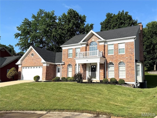720 Woodridge Heights Ct, Manchester, MO 63011 - colonial home with a chimney, brick siding, an attached garage, and driveway