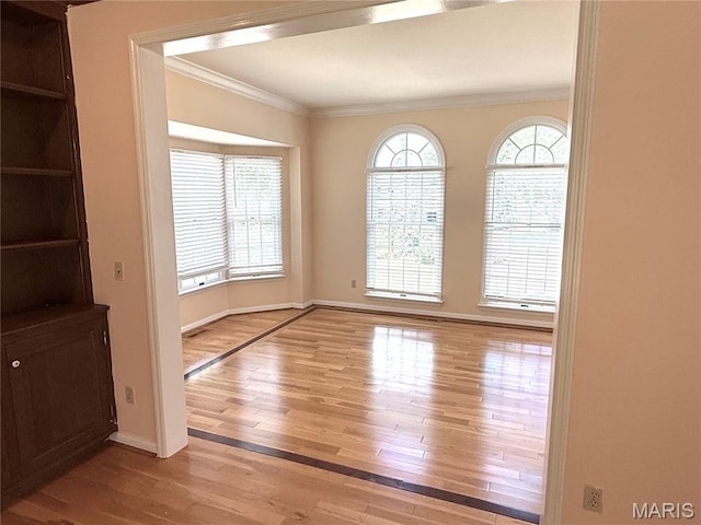 720 Woodridge Heights Ct, Manchester, MO 63011 - empty room featuring crown molding and light wood-type flooring