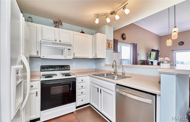 228 Centerfield Dr, Ofallon, MO 63366 - kitchen with white appliances, a peninsula, light countertops, and white cabinetry