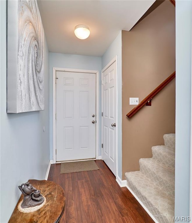 228 Centerfield Dr, Ofallon, MO 63366 - entrance foyer with dark wood-type flooring and stairs