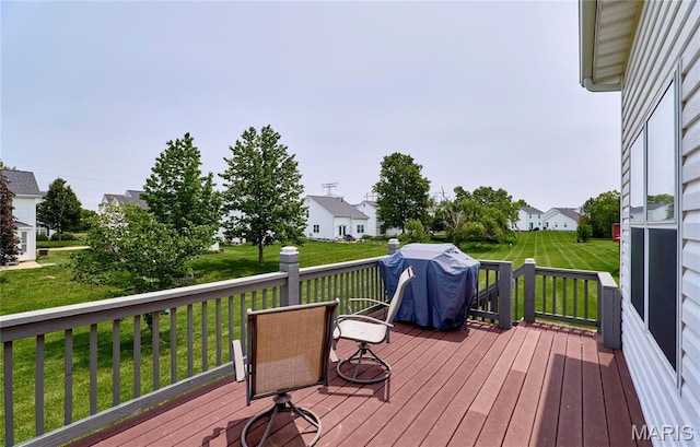 228 Centerfield Dr, Ofallon, MO 63366 - wooden deck with a grill, a yard, and a residential view
