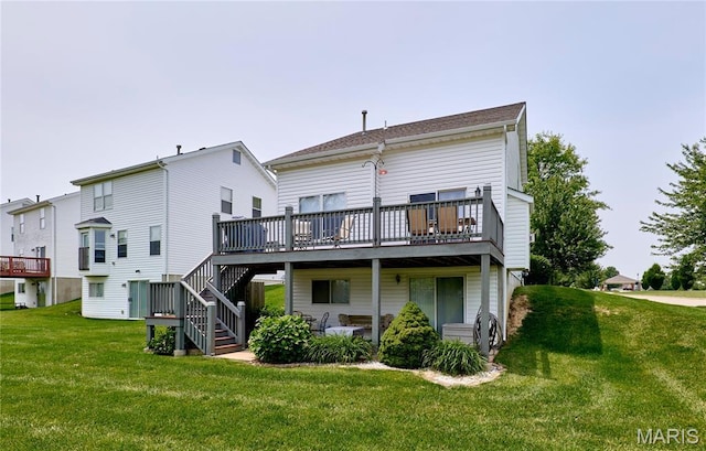 228 Centerfield Dr, Ofallon, MO 63366 - back of property featuring a deck, a yard, and stairs