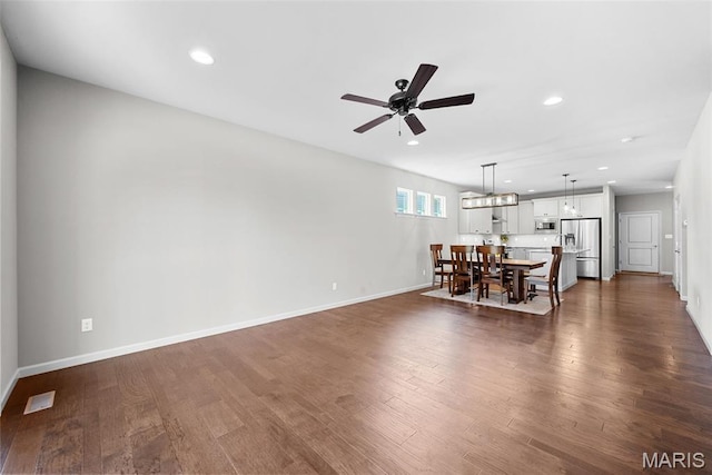 14 Ivyleigh Ct, Saint Charles, MO 63303 - living area with ceiling fan, dark wood finished floors, and recessed lighting
